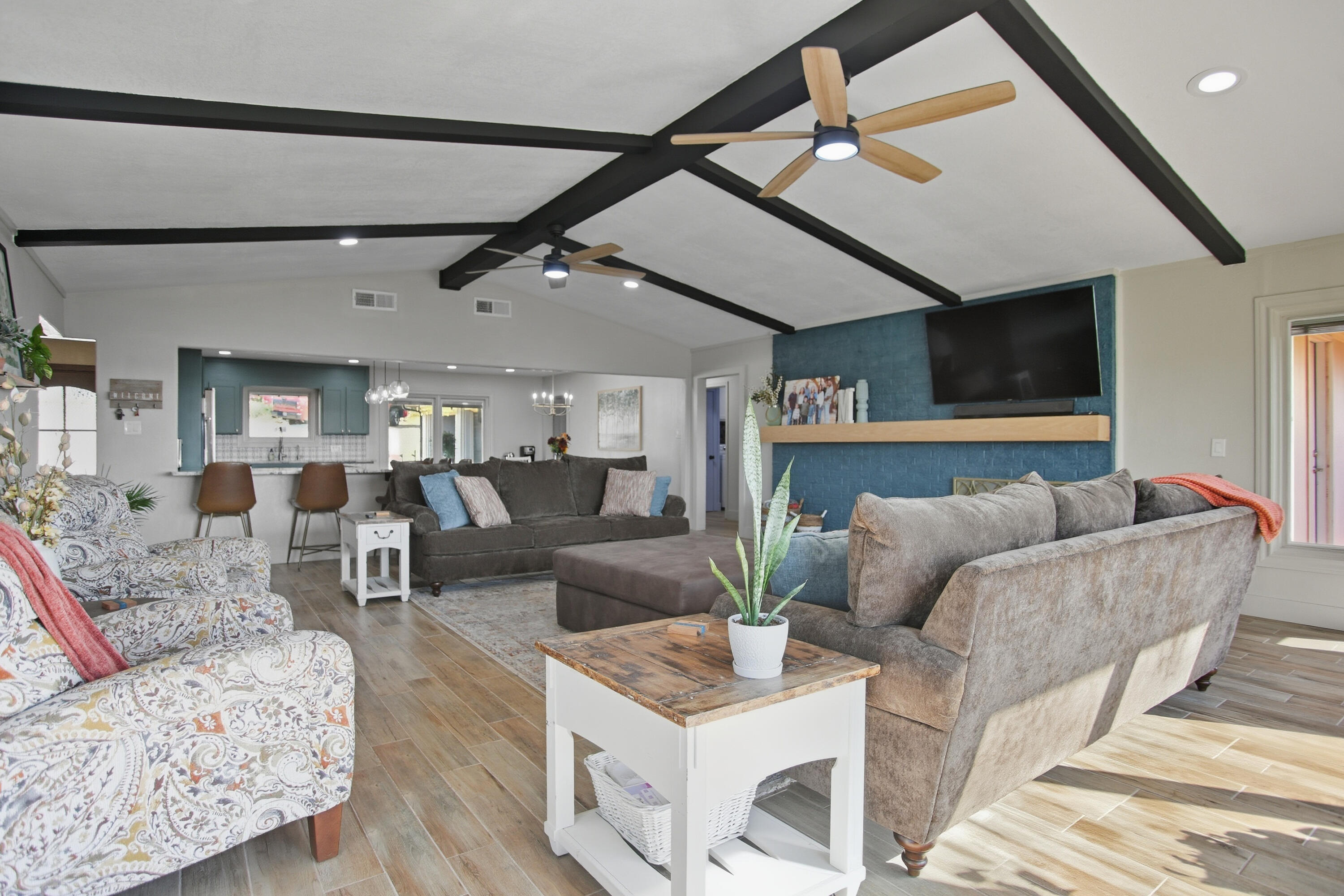 25 East Canyonview Drive Ransom Canyon, TX 79366 - Photo 8 of 58 a living room with furniture and a flat screen tv