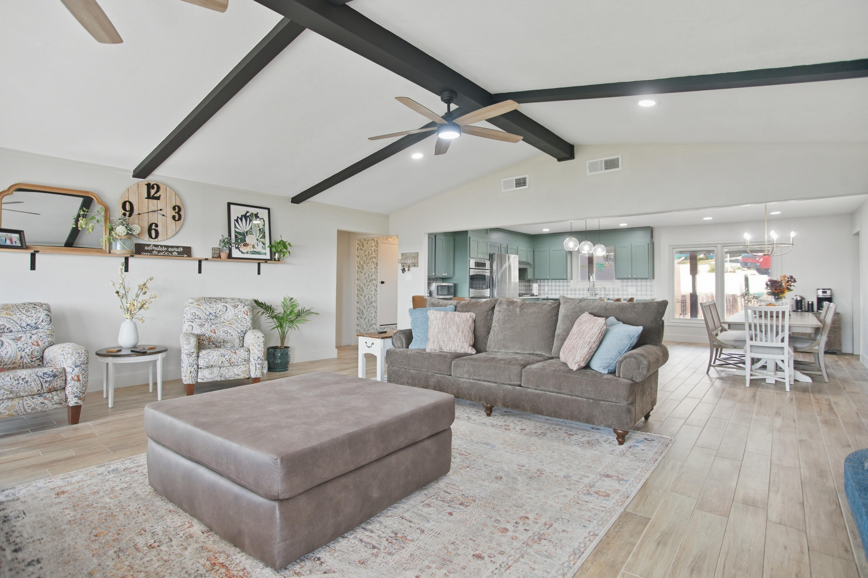 25 East Canyonview Drive Ransom Canyon, TX 79366 - Photo 10 of 58 a living room with furniture and wooden floor