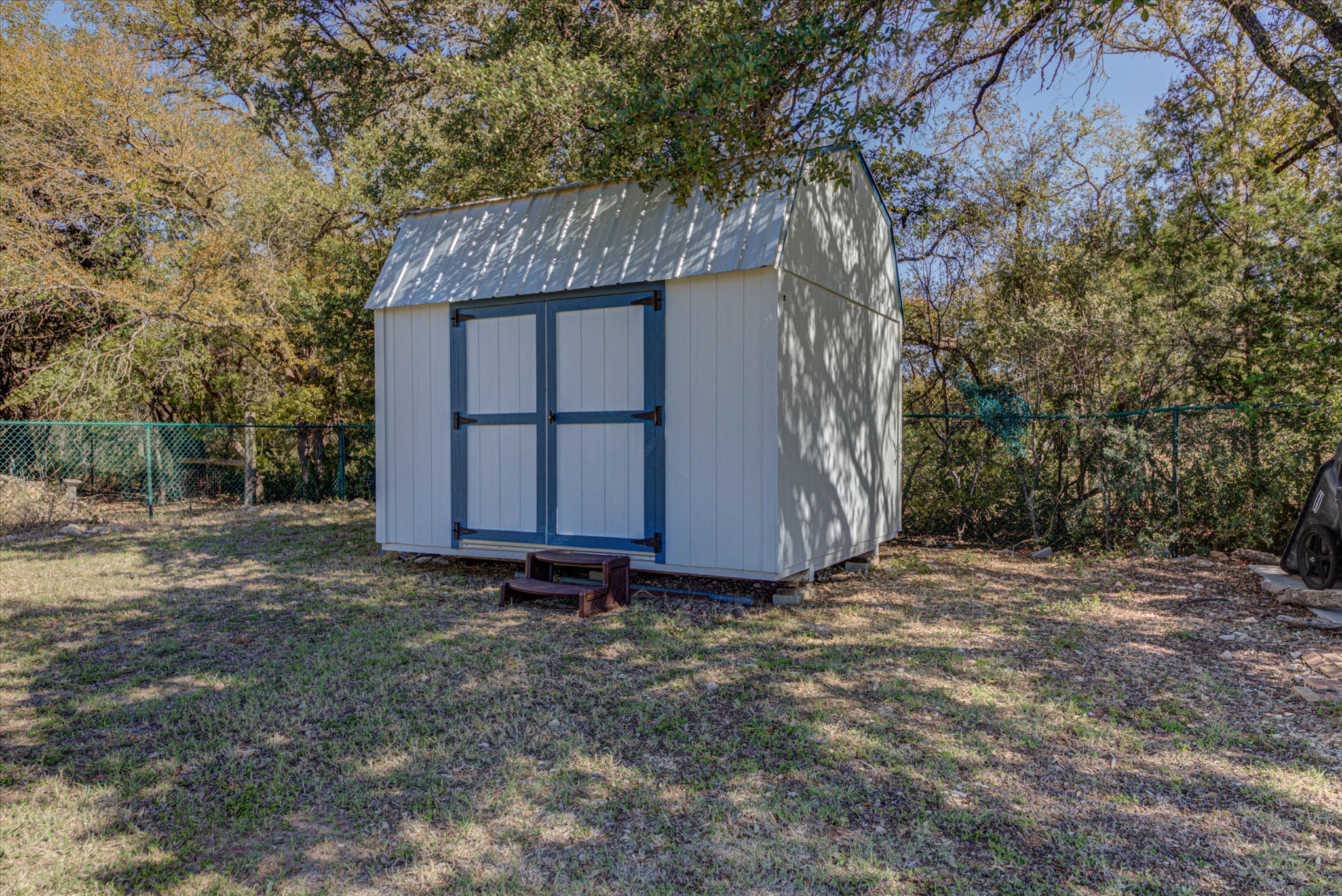 200 Harbor Circle Georgetown, TX 78633 - Photo 29 of 38 a view of a barn in the middle of a yard