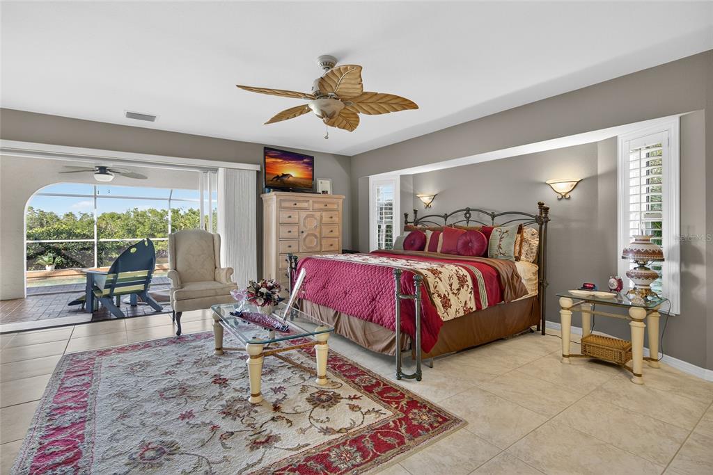 2855 Deborah Drive Punta Gorda, FL 33950 - Photo 14 of 41 a bed room with a bed and a chair