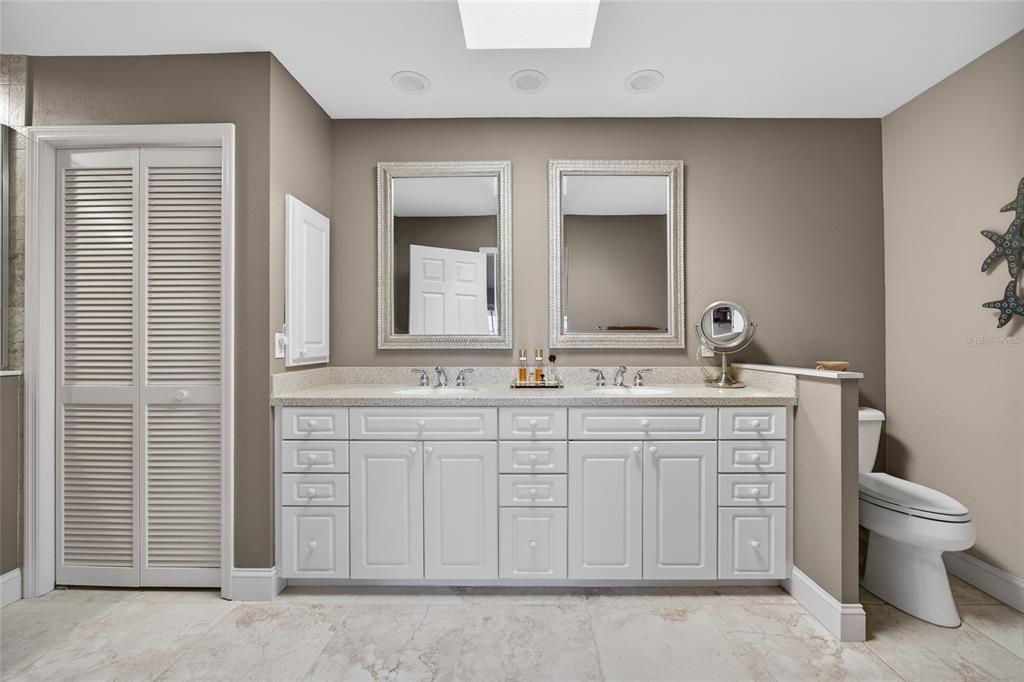 2855 Deborah Drive Punta Gorda, FL 33950 - Photo 16 of 41 a bathroom with a toilet sink and mirror