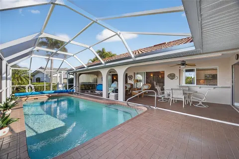 a view of a swimming pool with a patio