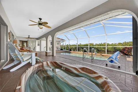 a view of a living room and a balcony