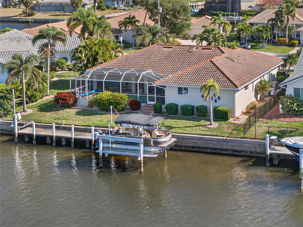 2855 Deborah Drive Punta Gorda, FL 33950 - Photo 28 of 41 a view of house with swimming pool and outdoor seating