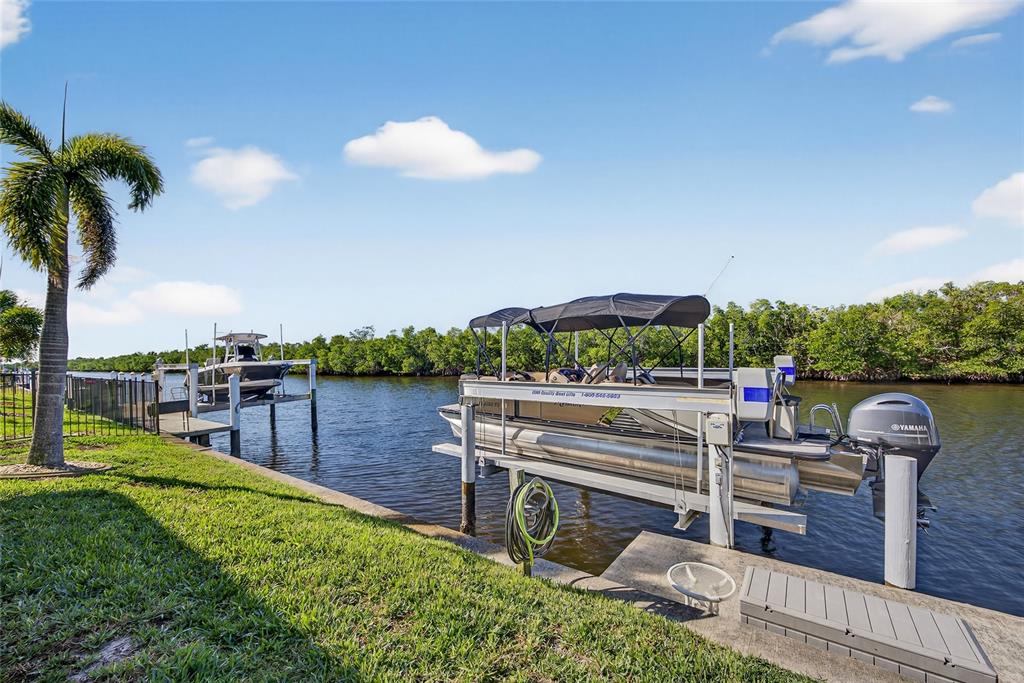 2855 Deborah Drive Punta Gorda, FL 33950 - Photo 31 of 41 a view of a garden with lawn chairs