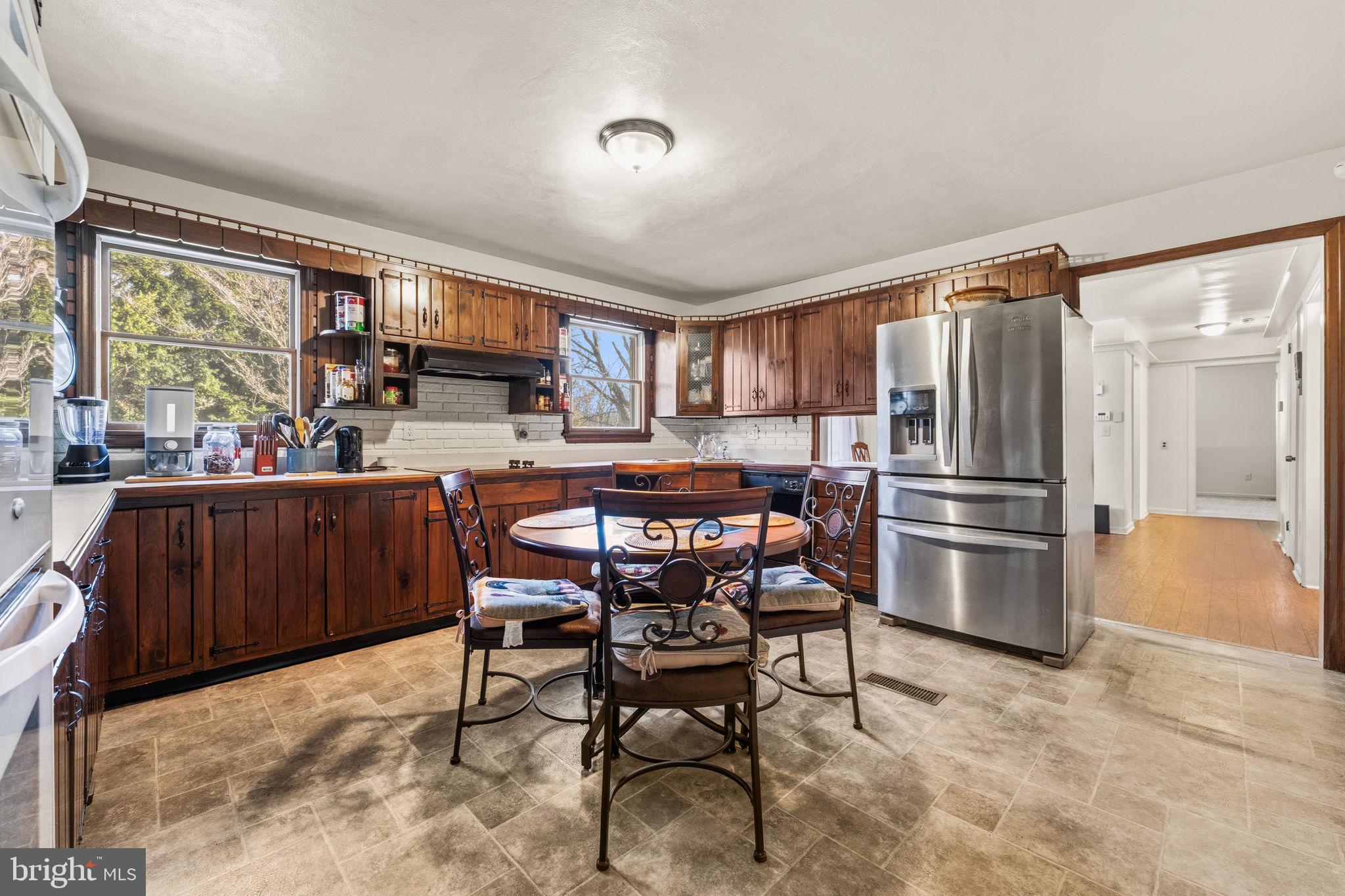 368 Appleton Road Elkton, MD 21921 - Photo 14 of 64 a kitchen with a table and chairs in it