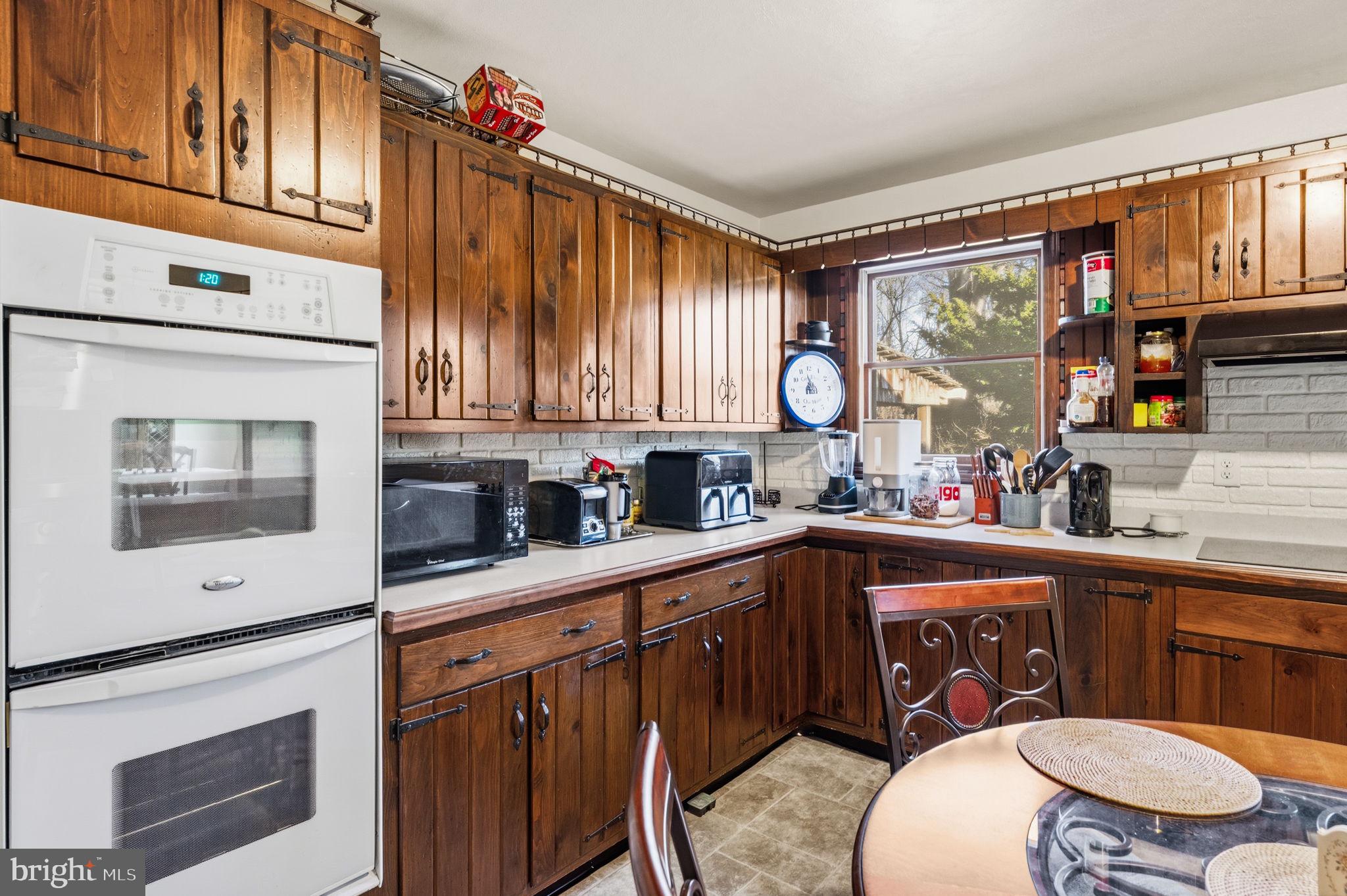 368 Appleton Road Elkton, MD 21921 - Photo 19 of 64 a kitchen with a sink cabinets and window