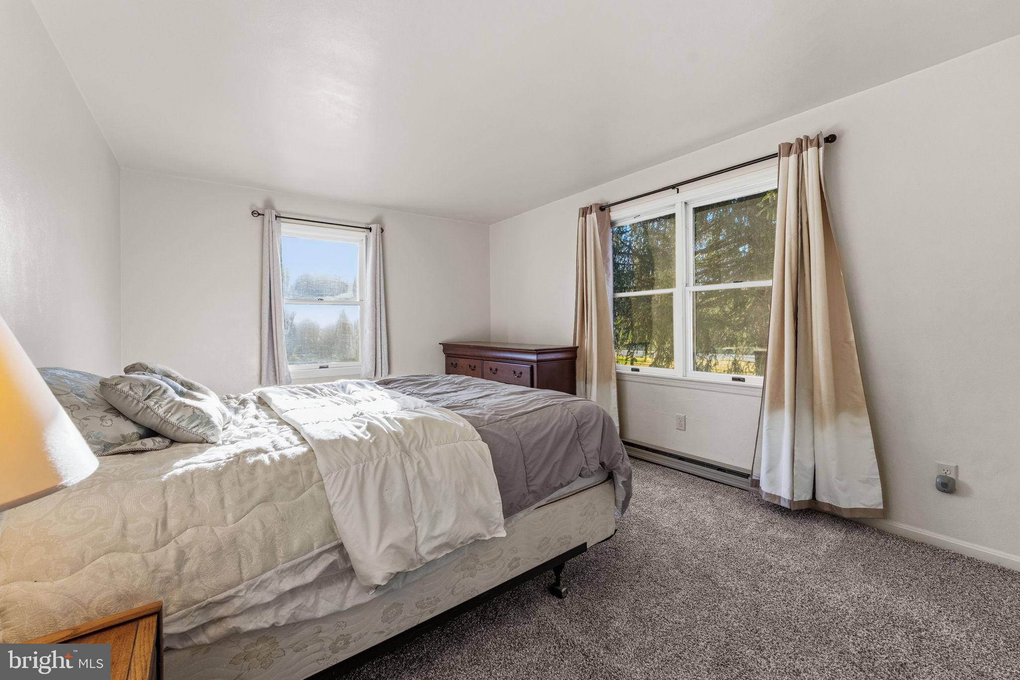 368 Appleton Road Elkton, MD 21921 - Photo 30 of 64 a bedroom with a bed and a window