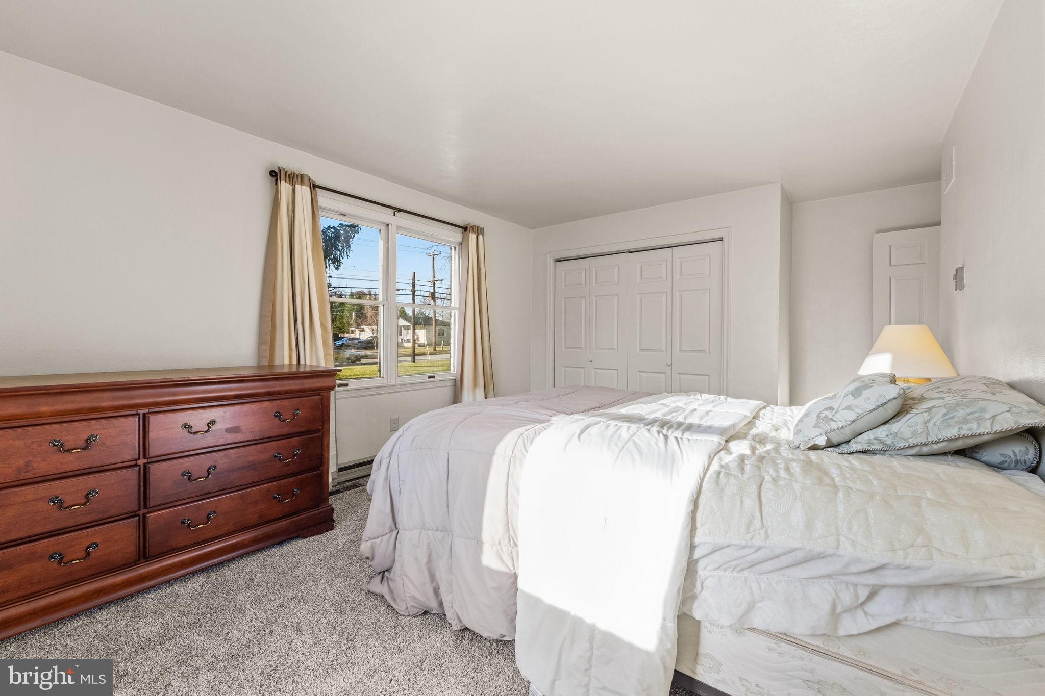 368 Appleton Road Elkton, MD 21921 - Photo 31 of 64 a bedroom with a bed and a window