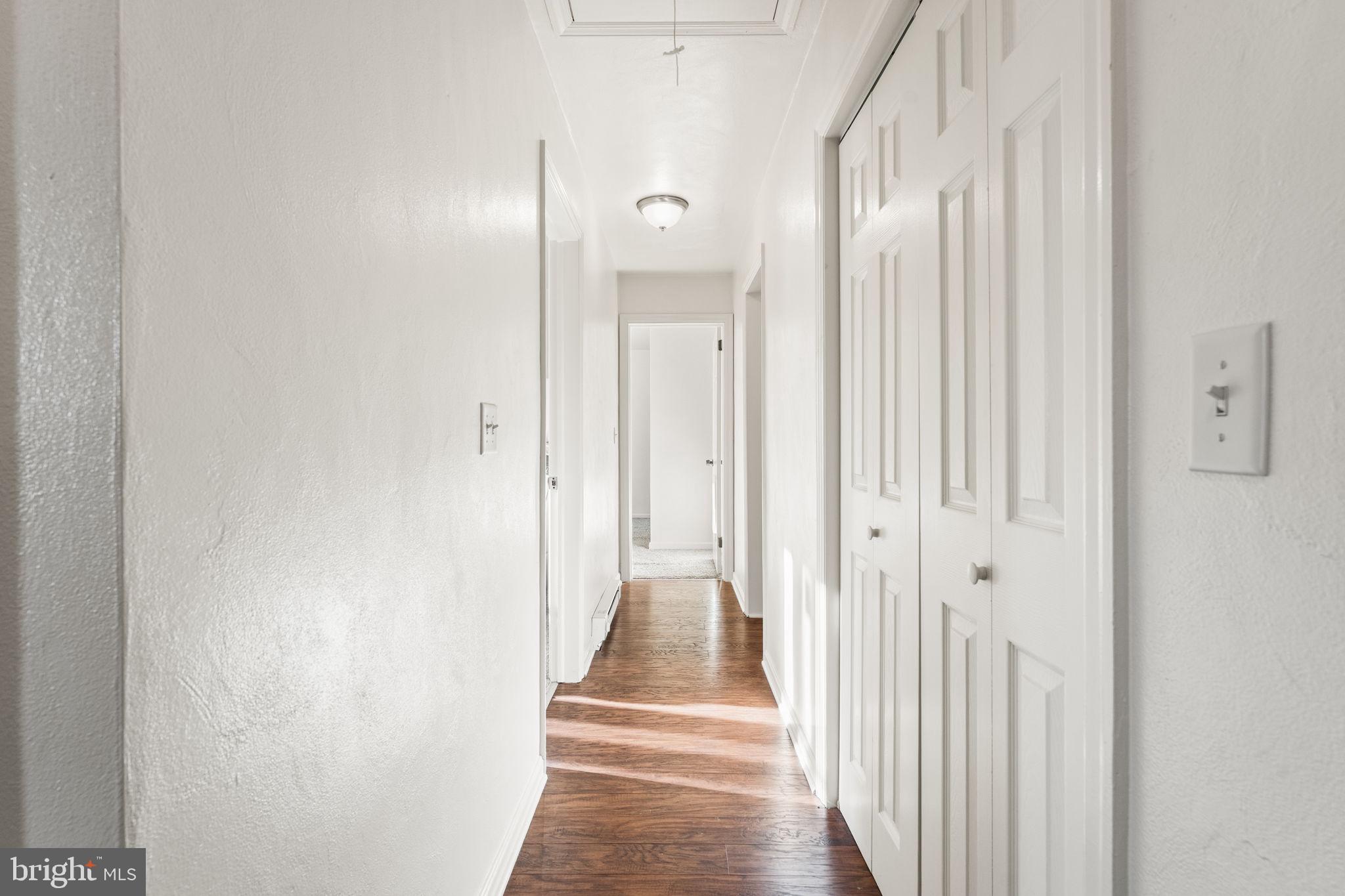 368 Appleton Road Elkton, MD 21921 - Photo 36 of 64 a view of a hallway with wooden floor and staircase