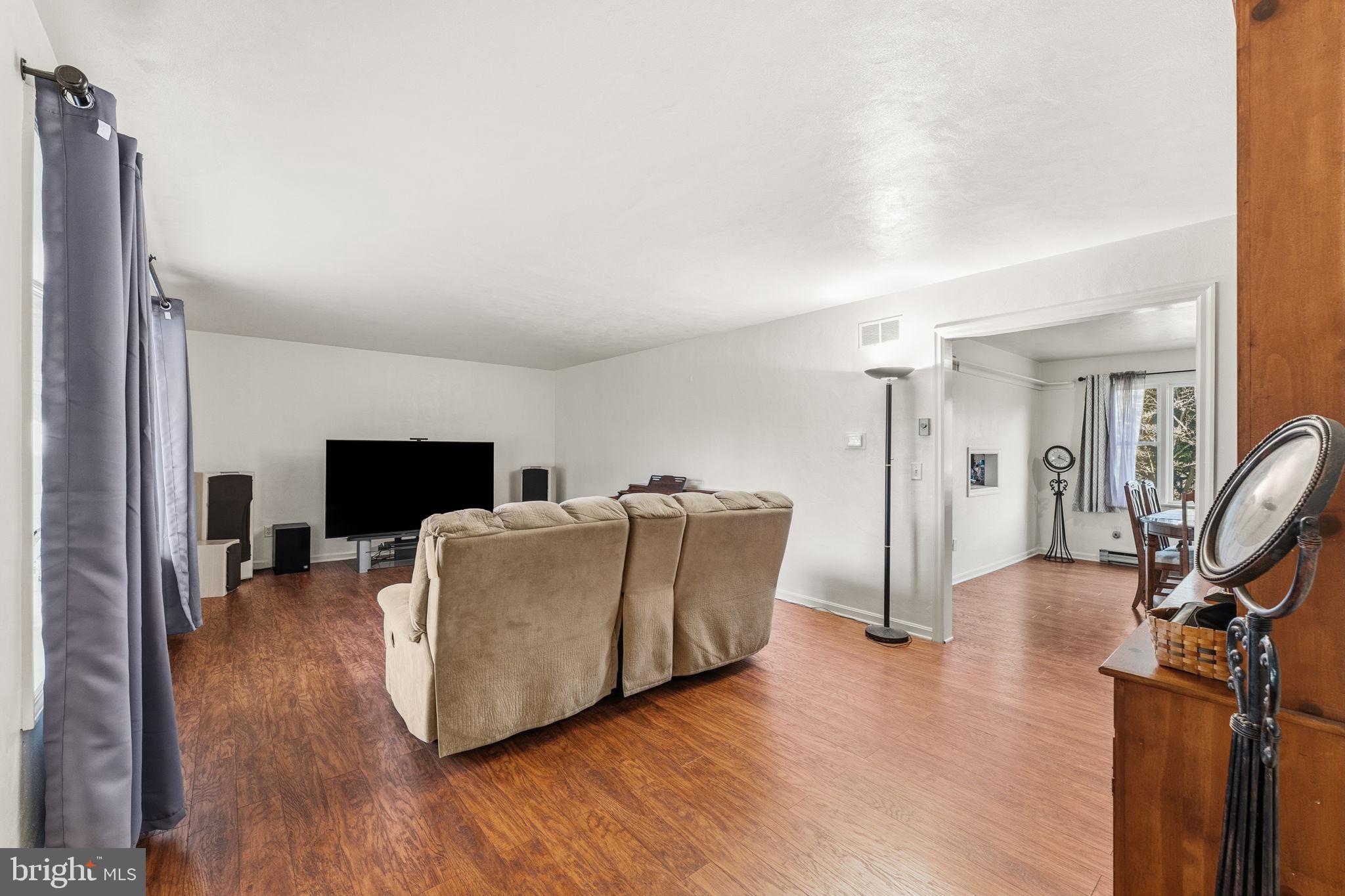 368 Appleton Road Elkton, MD 21921 - Photo 5 of 64 a living room with furniture and a flat screen tv