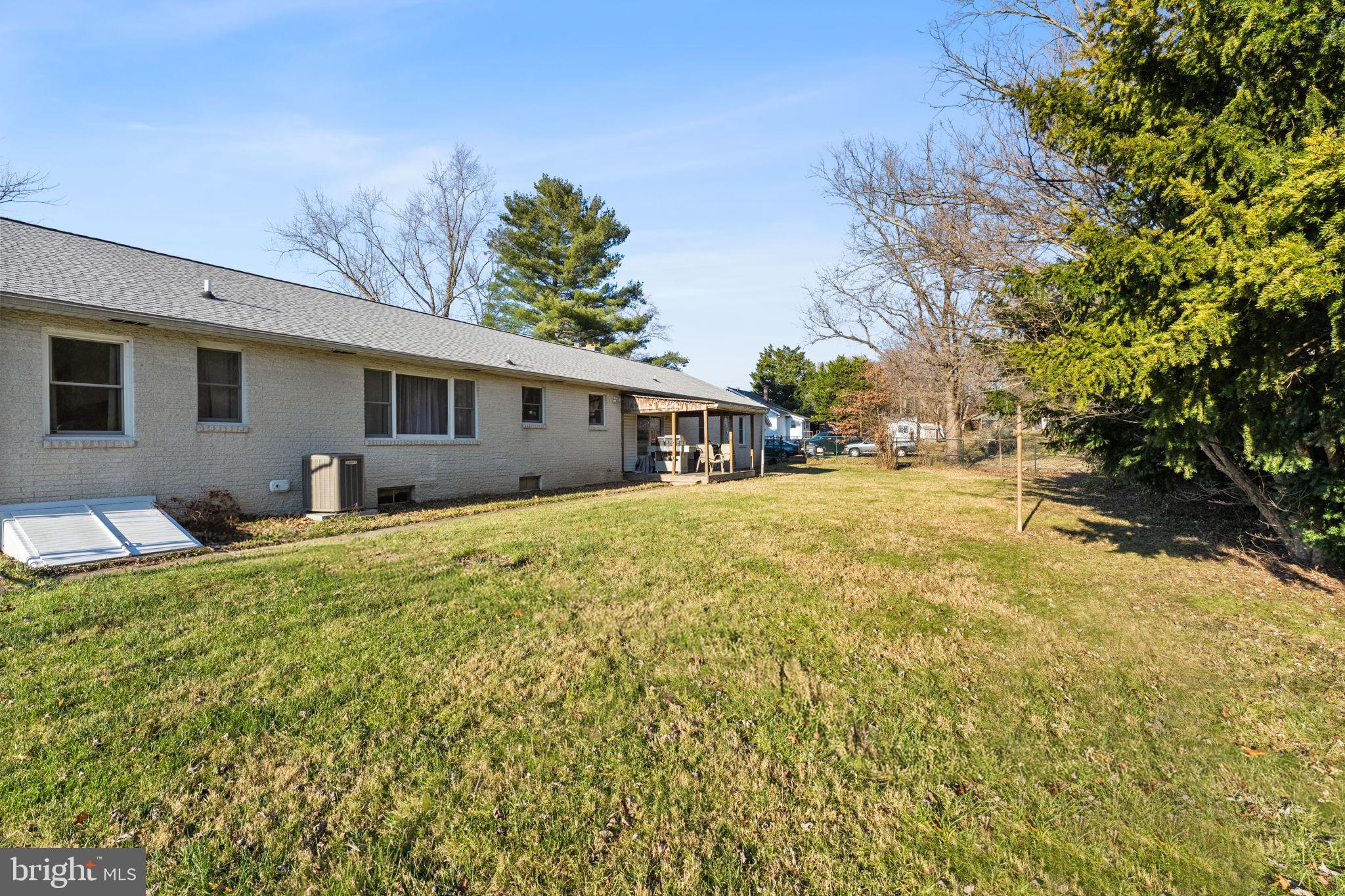 368 Appleton Road Elkton, MD 21921 - Photo 58 of 64 a front view of house with yard and trees in the background