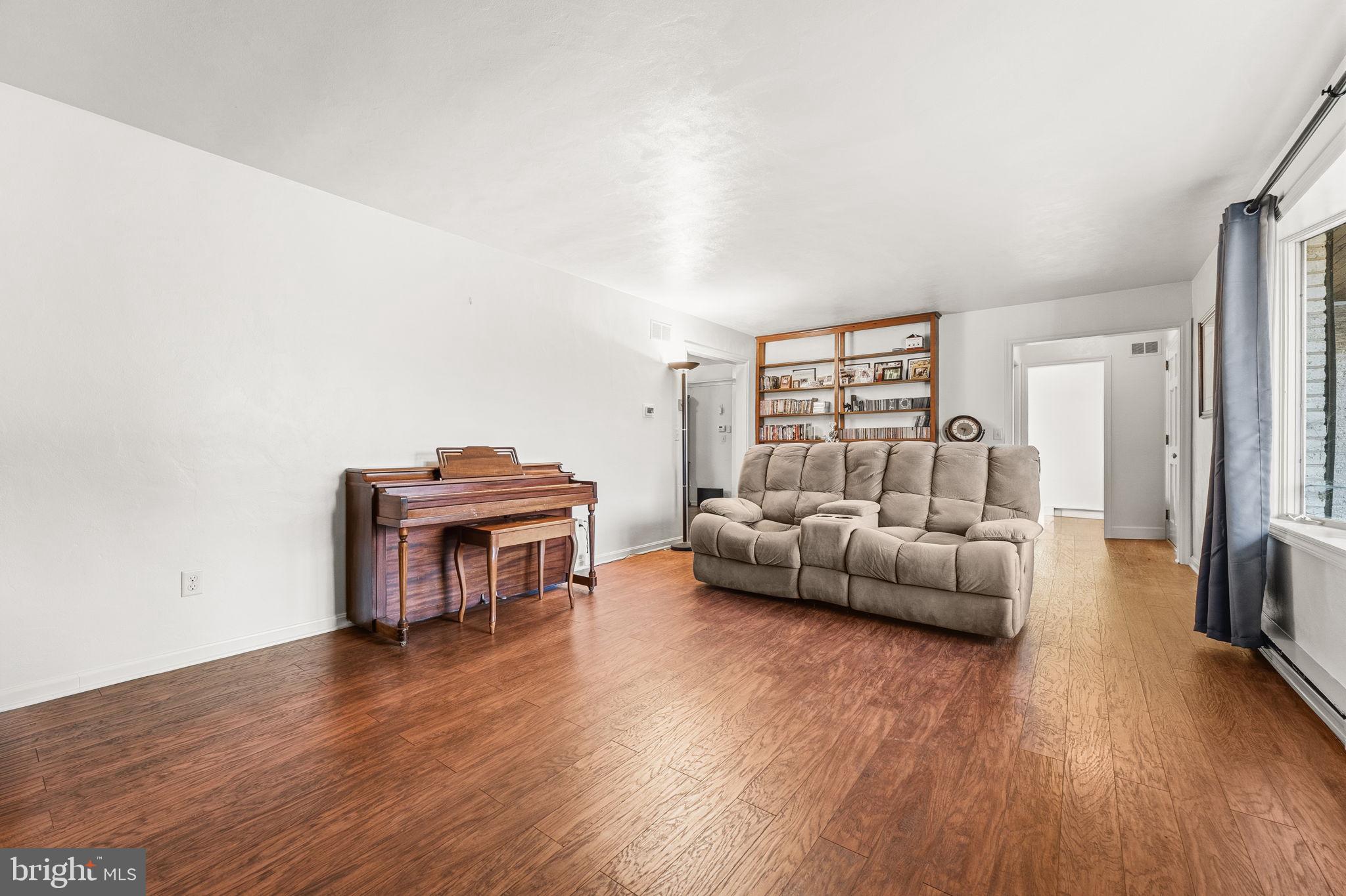 368 Appleton Road Elkton, MD 21921 - Photo 8 of 64 a living room with furniture and a wooden floor