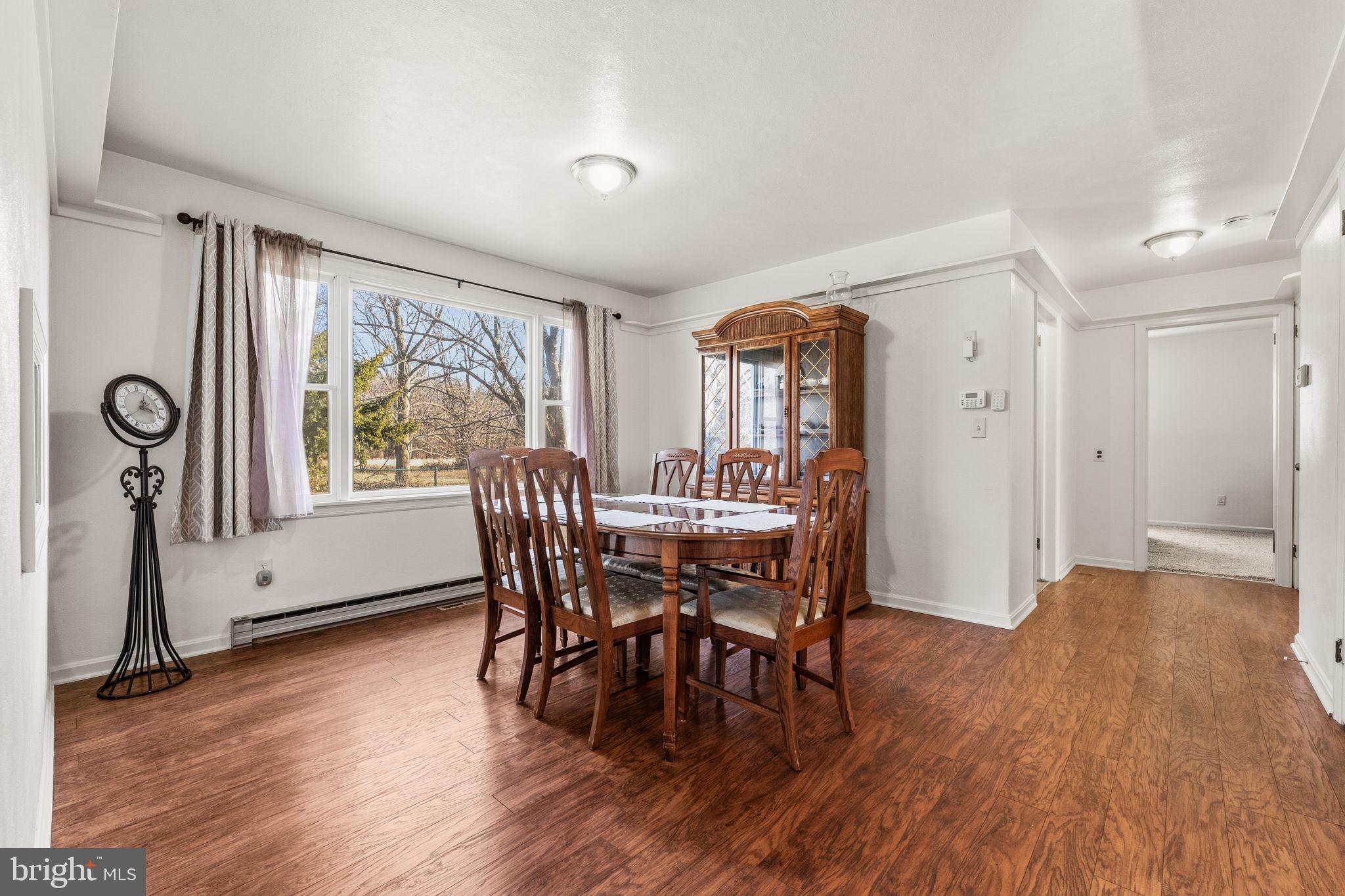 368 Appleton Road Elkton, MD 21921 - Photo 10 of 64 a view of a dining room with furniture window and wooden floor