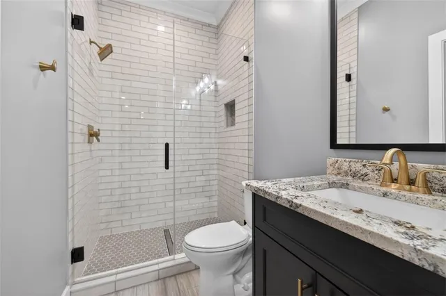 a bathroom with a shower and a shower curtain