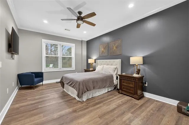 a view of a swimming pool with an outdoor seating