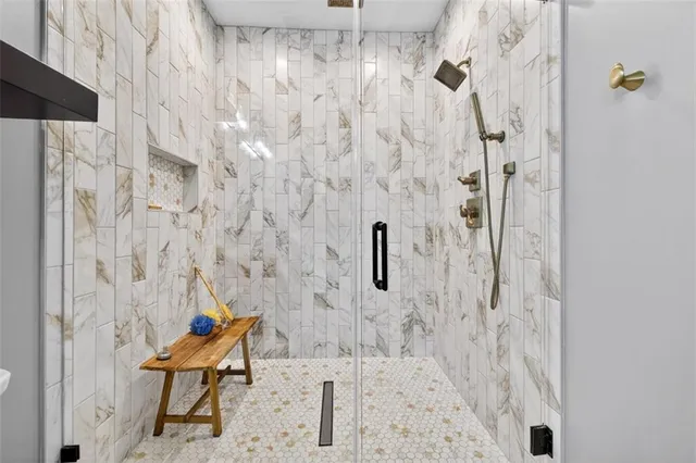 a roof deck with a table and chairs