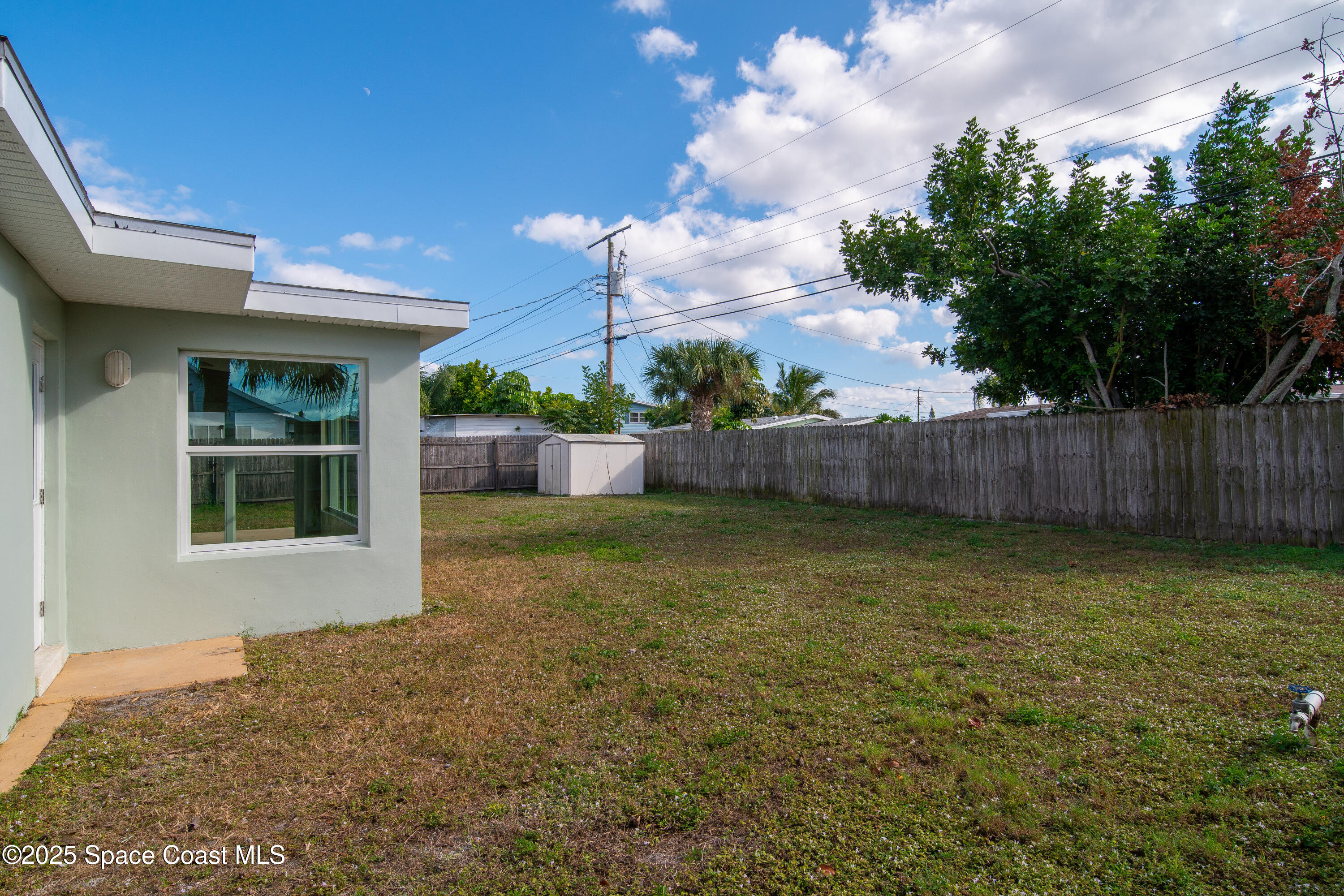 1705 Sarno Acc Melbourne, FL 32935 - Photo 15 of 40 a view of a backyard