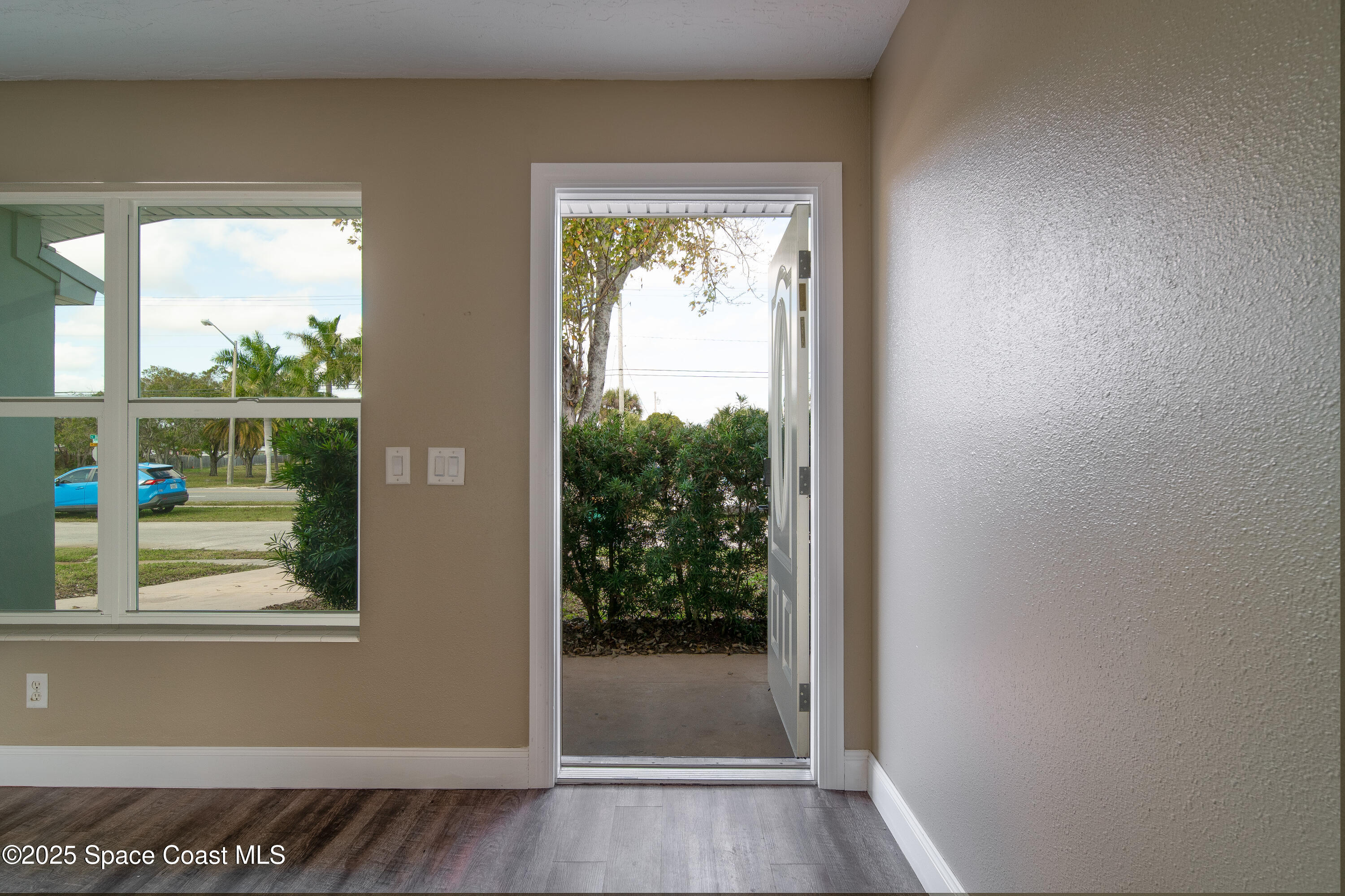 1705 Sarno Acc Melbourne, FL 32935 - Photo 17 of 40 a view of a room that has a window