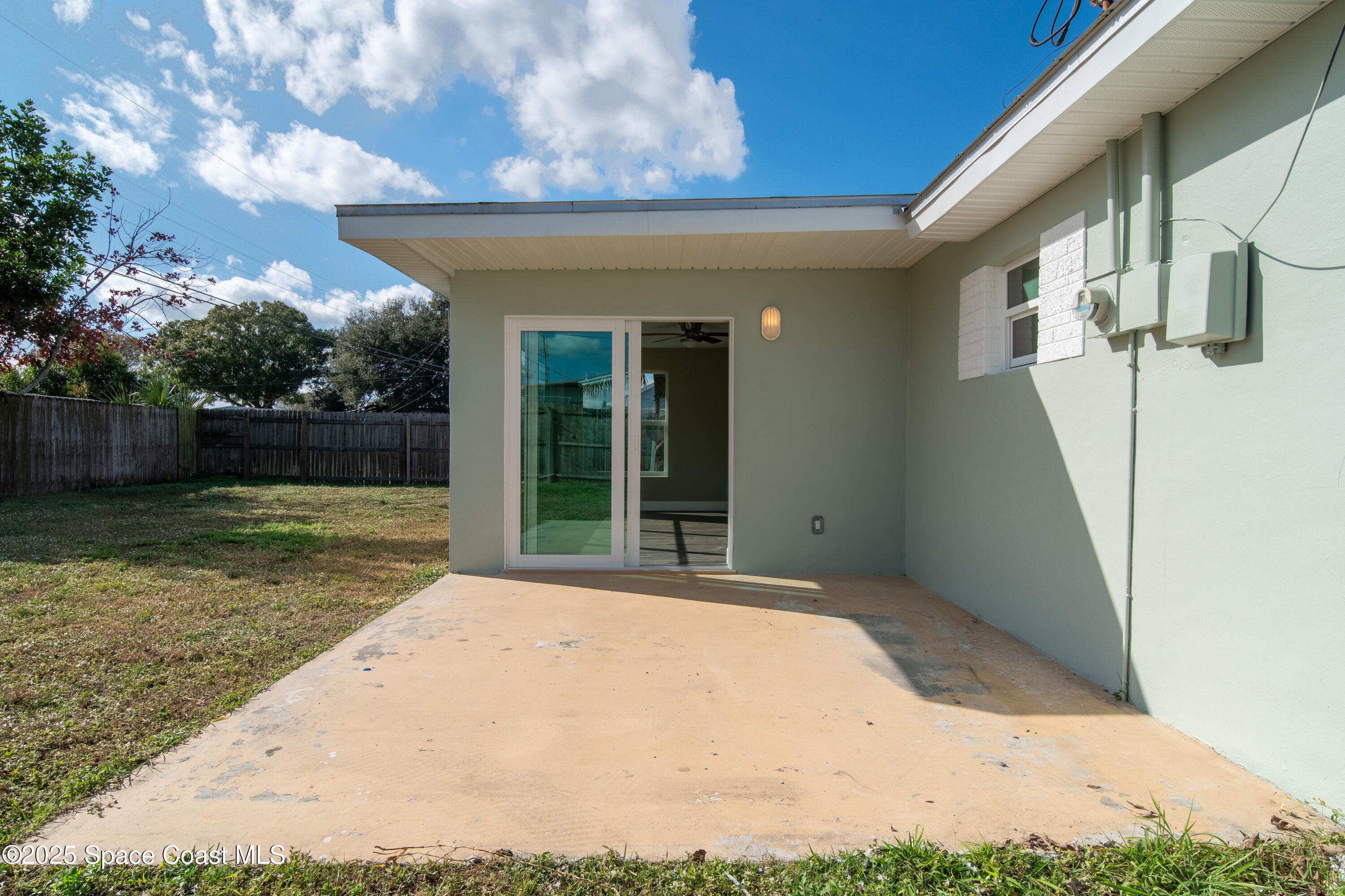 1705 Sarno Acc Melbourne, FL 32935 - Photo 24 of 40 a view of a house with backyard and garden