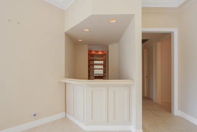 a view of a dining room with furniture and window