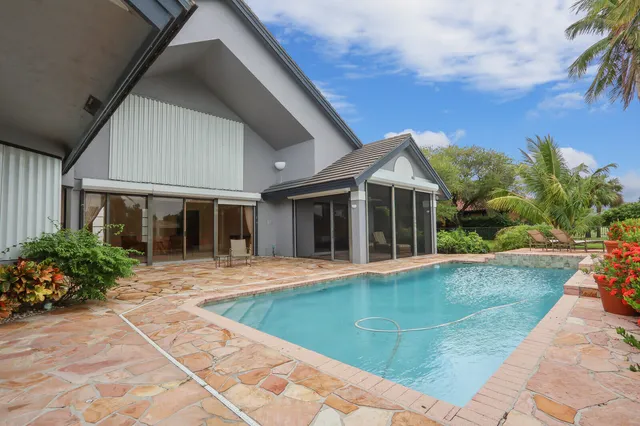 a view of a backyard with a patio