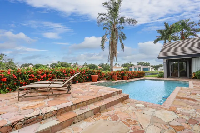 a view of a house with a swimming pool
