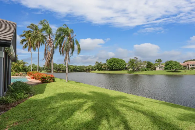 a view of an entryway with a floor to ceiling window