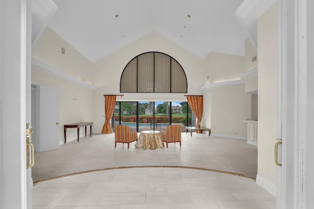 a view of swimming pool with a patio