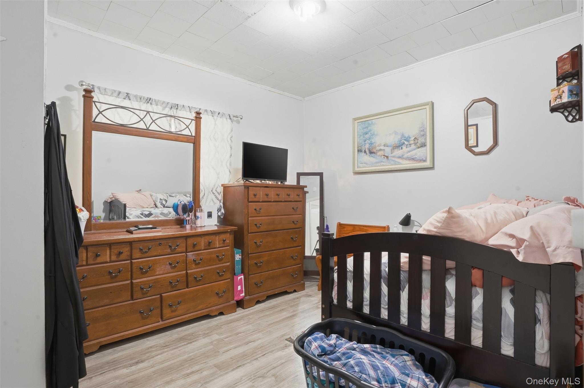 6 Short Road Wurtsboro, NY 12790 - Photo 18 of 48 a bedroom with a bed and wooden floor