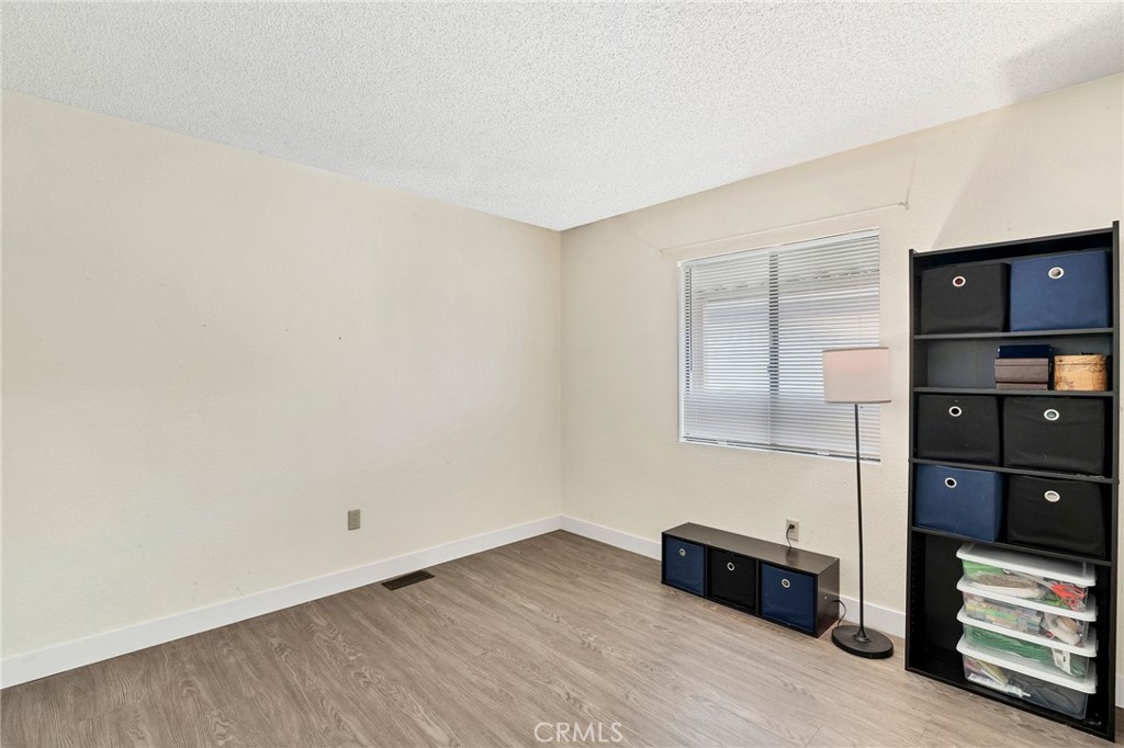 24800 Cornstalk Road Wildomar, CA 92595 - Photo 13 of 23 a view of workspace with wooden floor