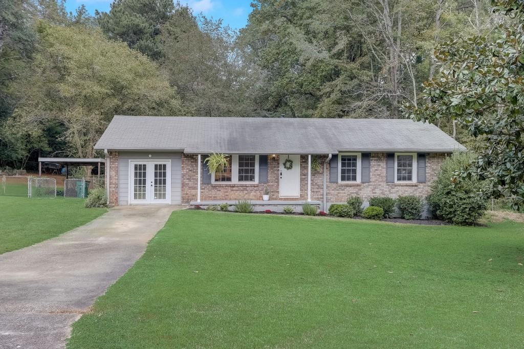4241 Citizen Circle Austell, GA 30106 - Photo 1 of 1 a front view of a house with a yard