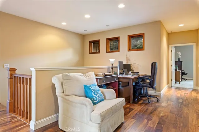 a bedroom with a bed and a mirror