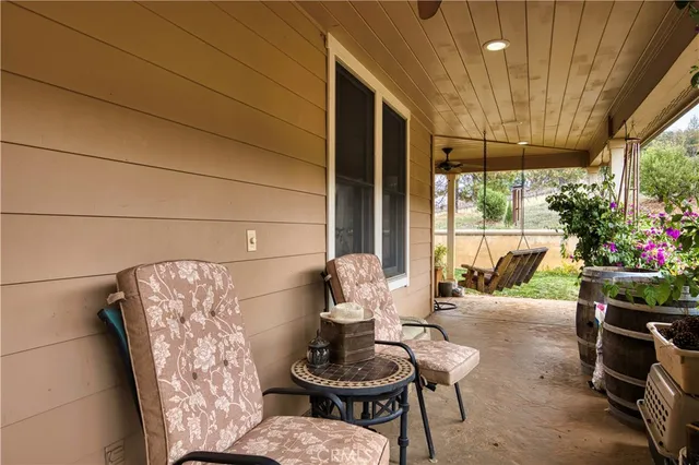 a bathroom with a toilet a sink and a mirror