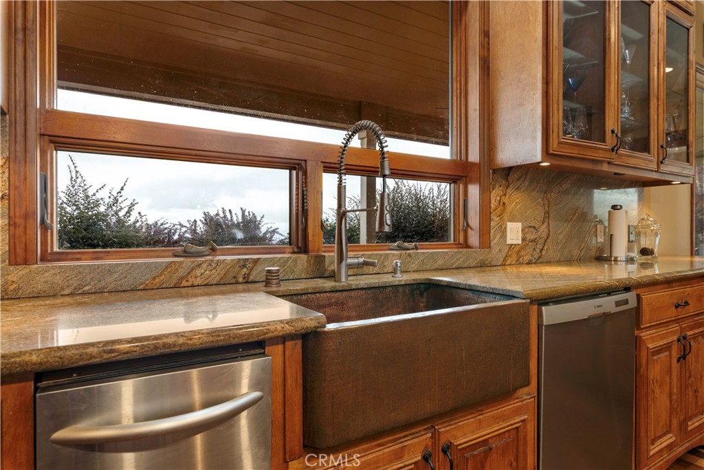 8664 Seigler Springs Road Kelseyville, CA 95451 - Photo 6 of 75 a kitchen that has a sink and a stove
