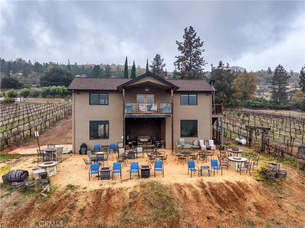 8664 Seigler Springs Road Kelseyville, CA 95451 - Photo 63 of 75 a view of a house with outdoor space and sitting area