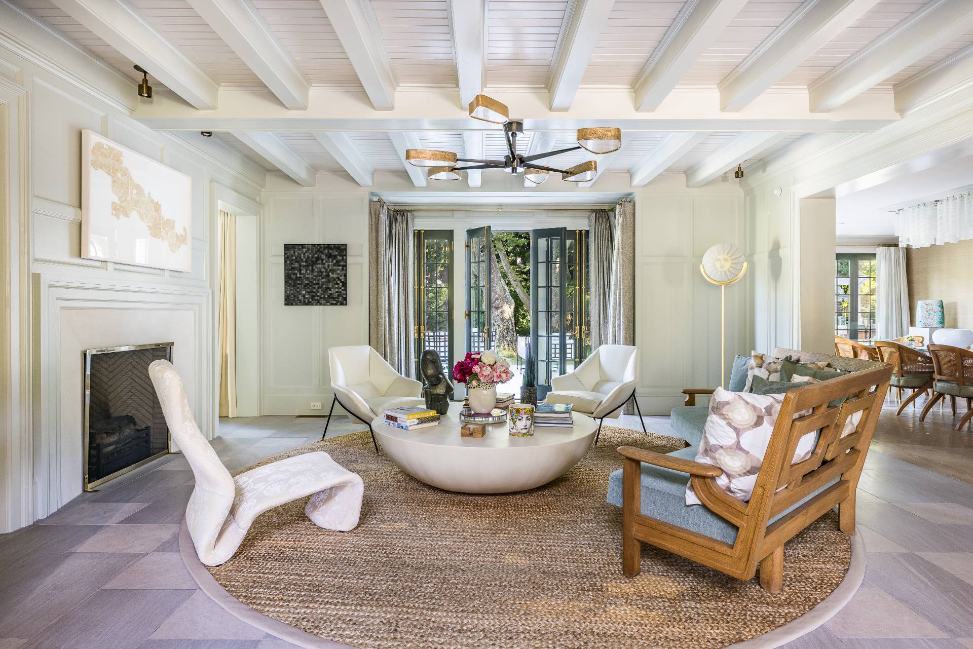 43 Lee Avenue East Hampton, NY 11937 - Photo 14 of 49 a living room with patio furniture and a fireplace