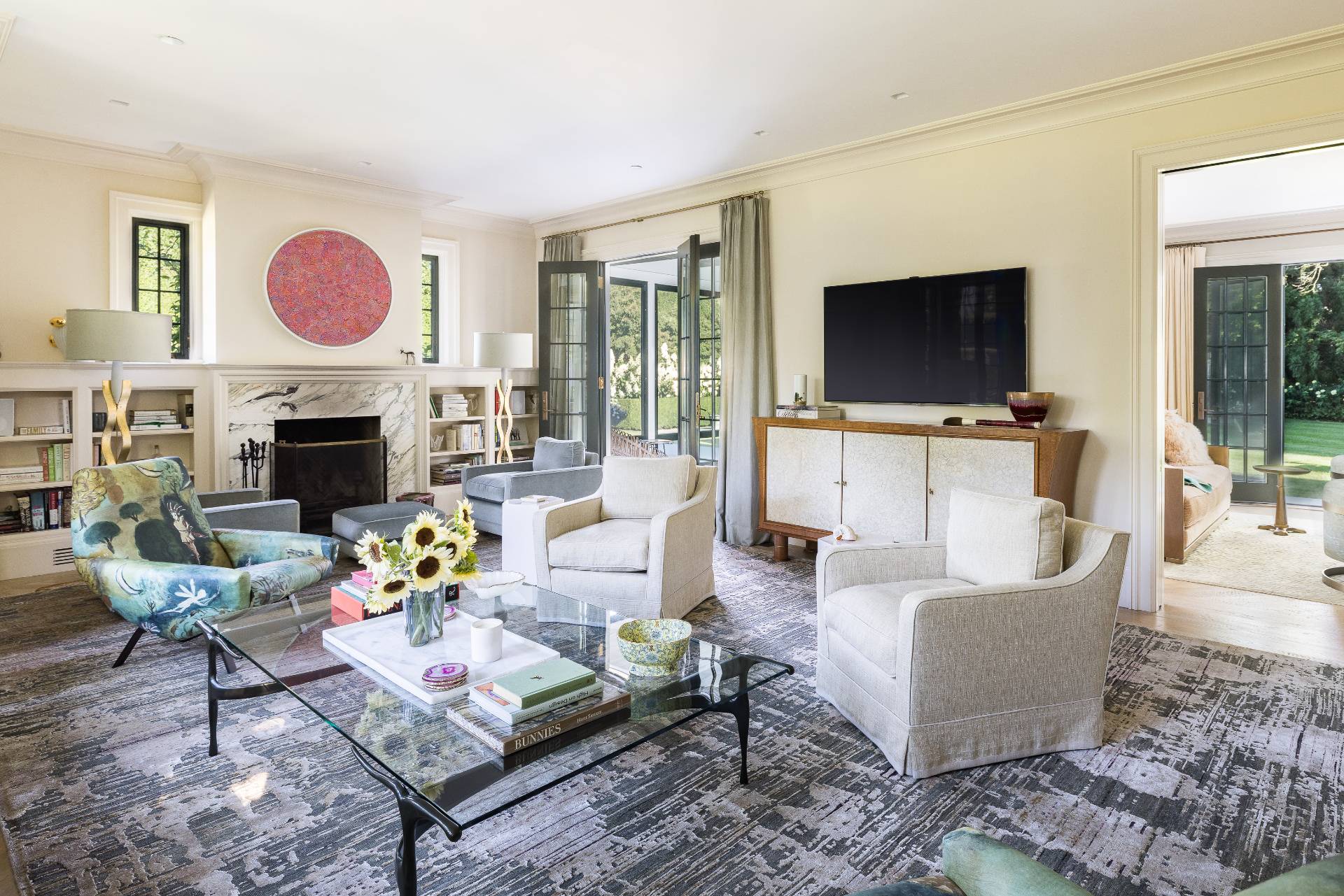 43 Lee Avenue East Hampton, NY 11937 - Photo 16 of 49 a living room with fireplace furniture and a flat screen tv