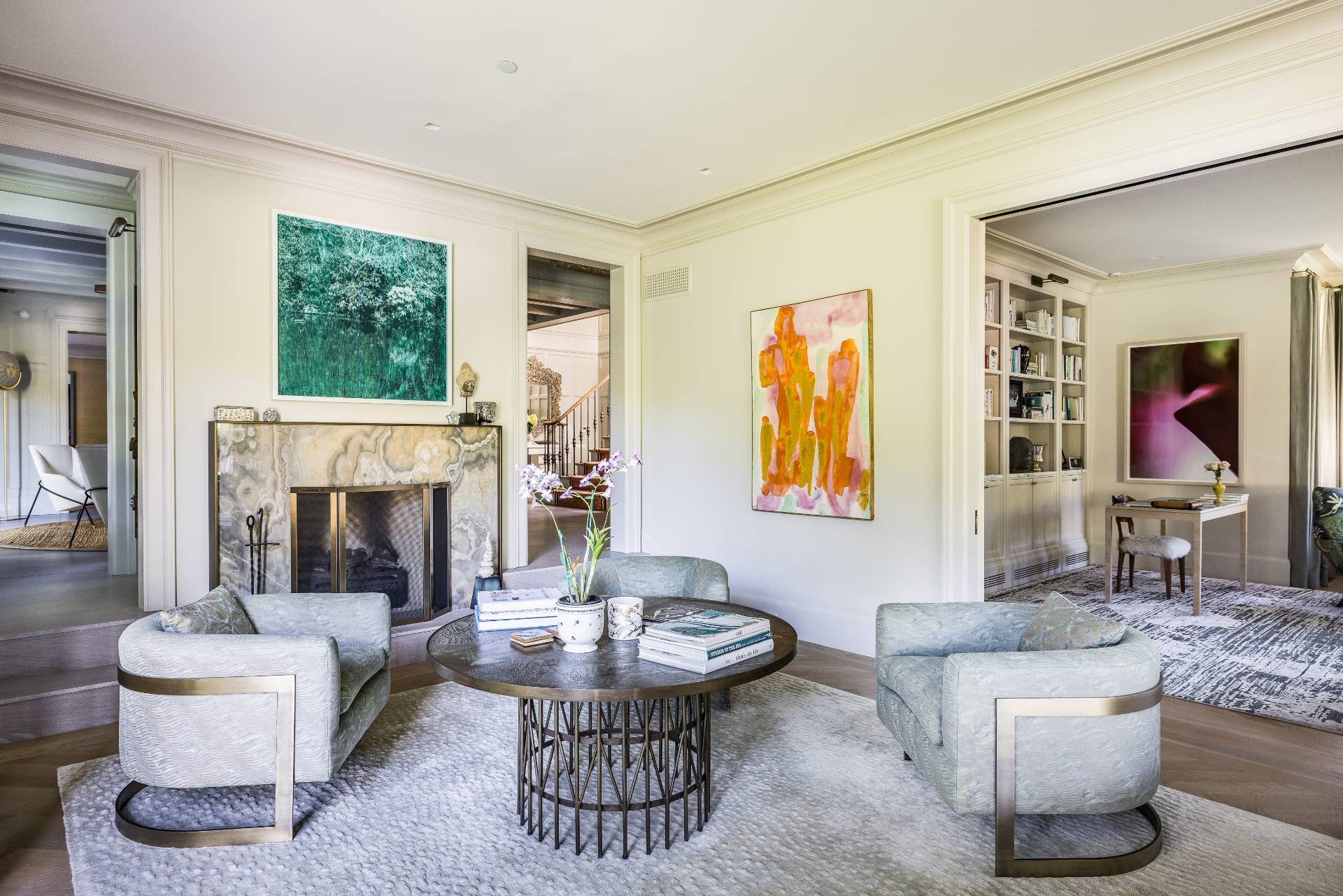 43 Lee Avenue East Hampton, NY 11937 - Photo 17 of 49 a living room with furniture a fireplace and a large window