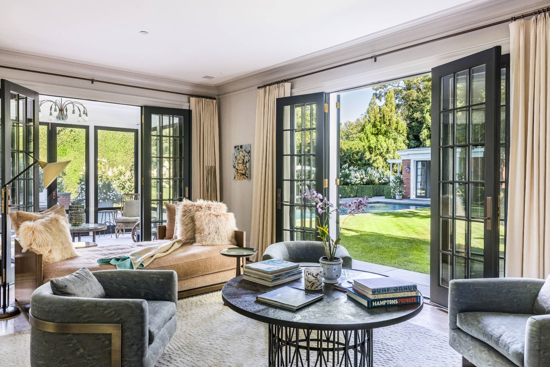 43 Lee Avenue East Hampton, NY 11937 - Photo 18 of 49 a living room with furniture and a large window