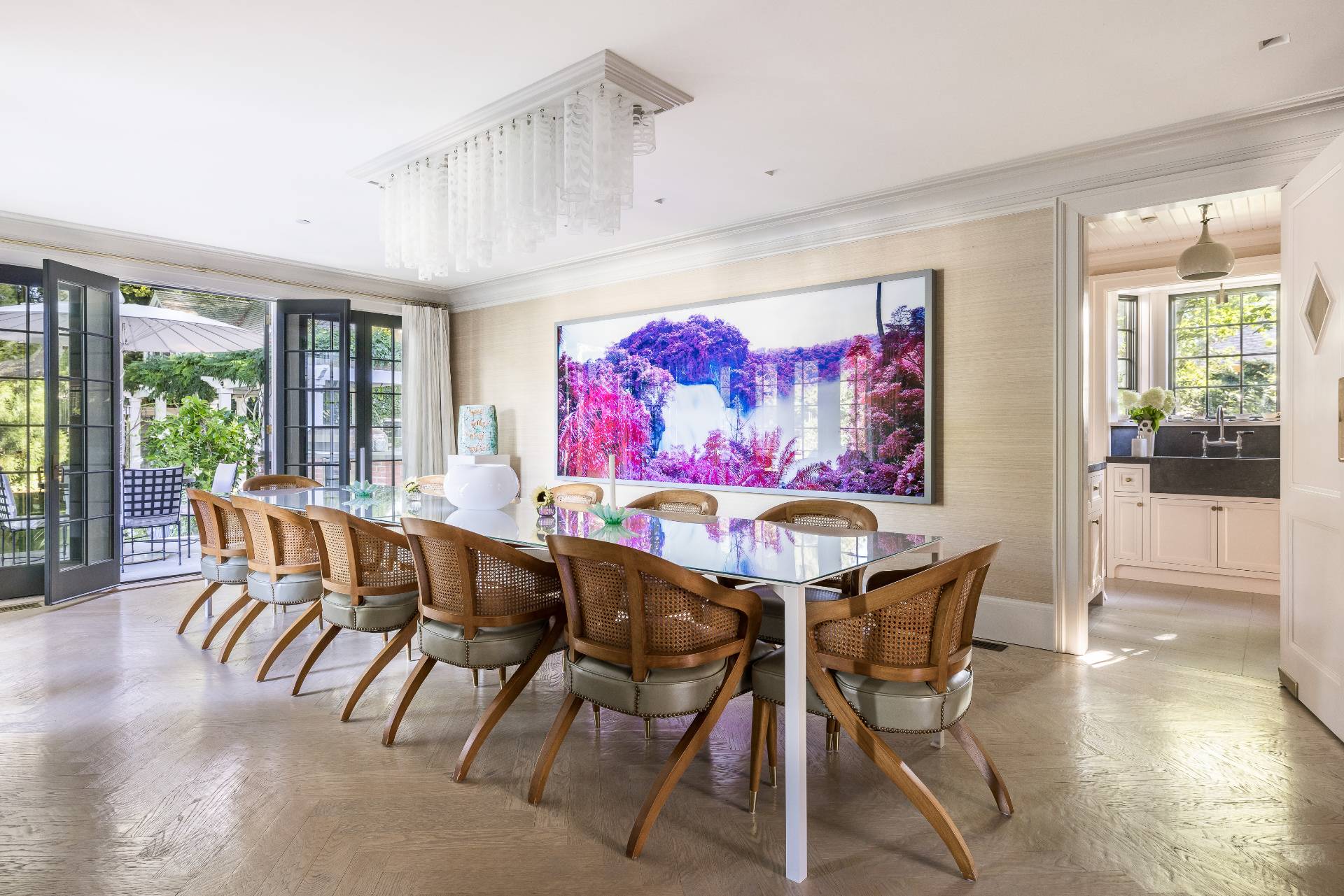 43 Lee Avenue East Hampton, NY 11937 - Photo 25 of 49 a view of a dining room with furniture large windows and wooden floor