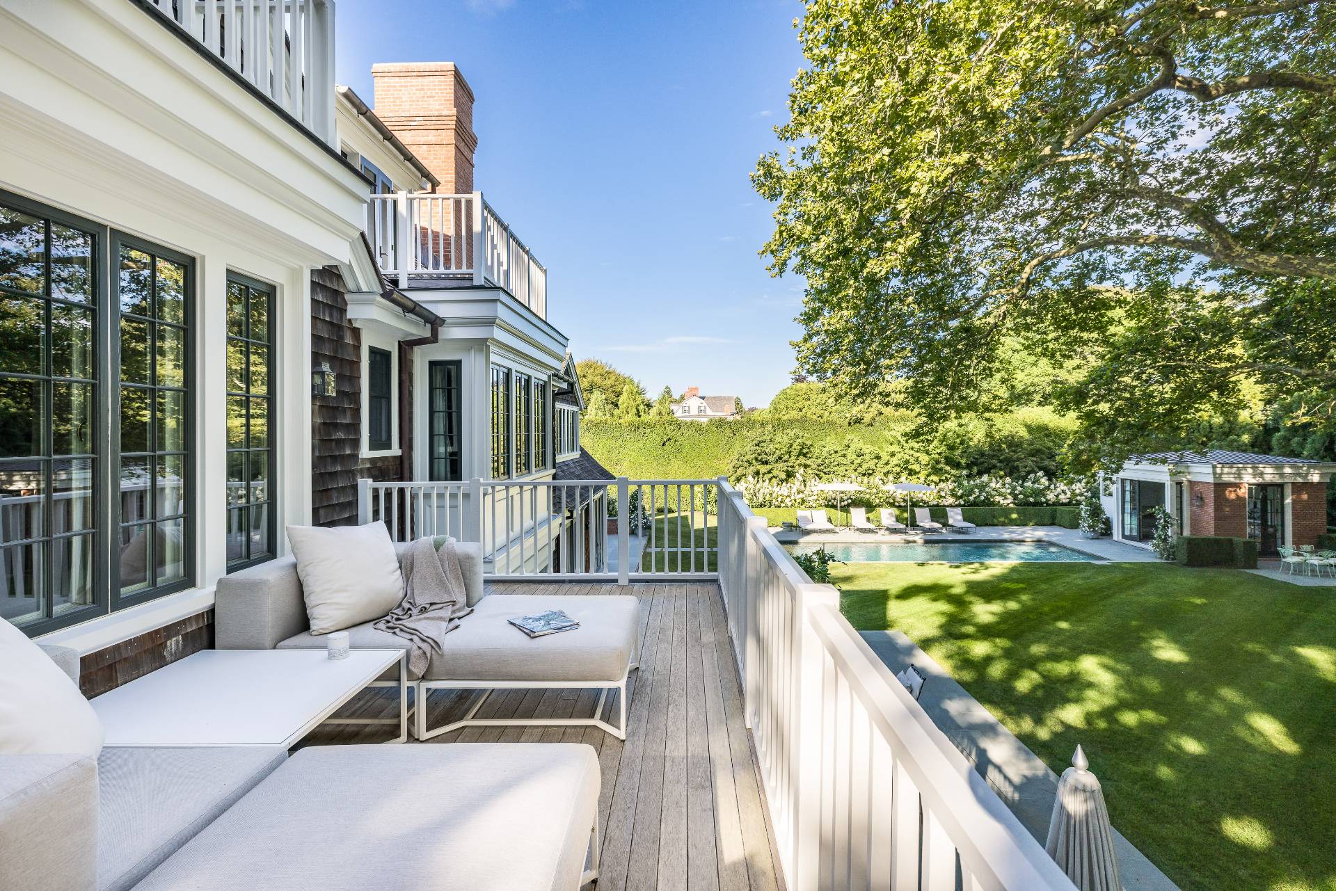 43 Lee Avenue East Hampton, NY 11937 - Photo 31 of 49 a balcony with furniture and garden view