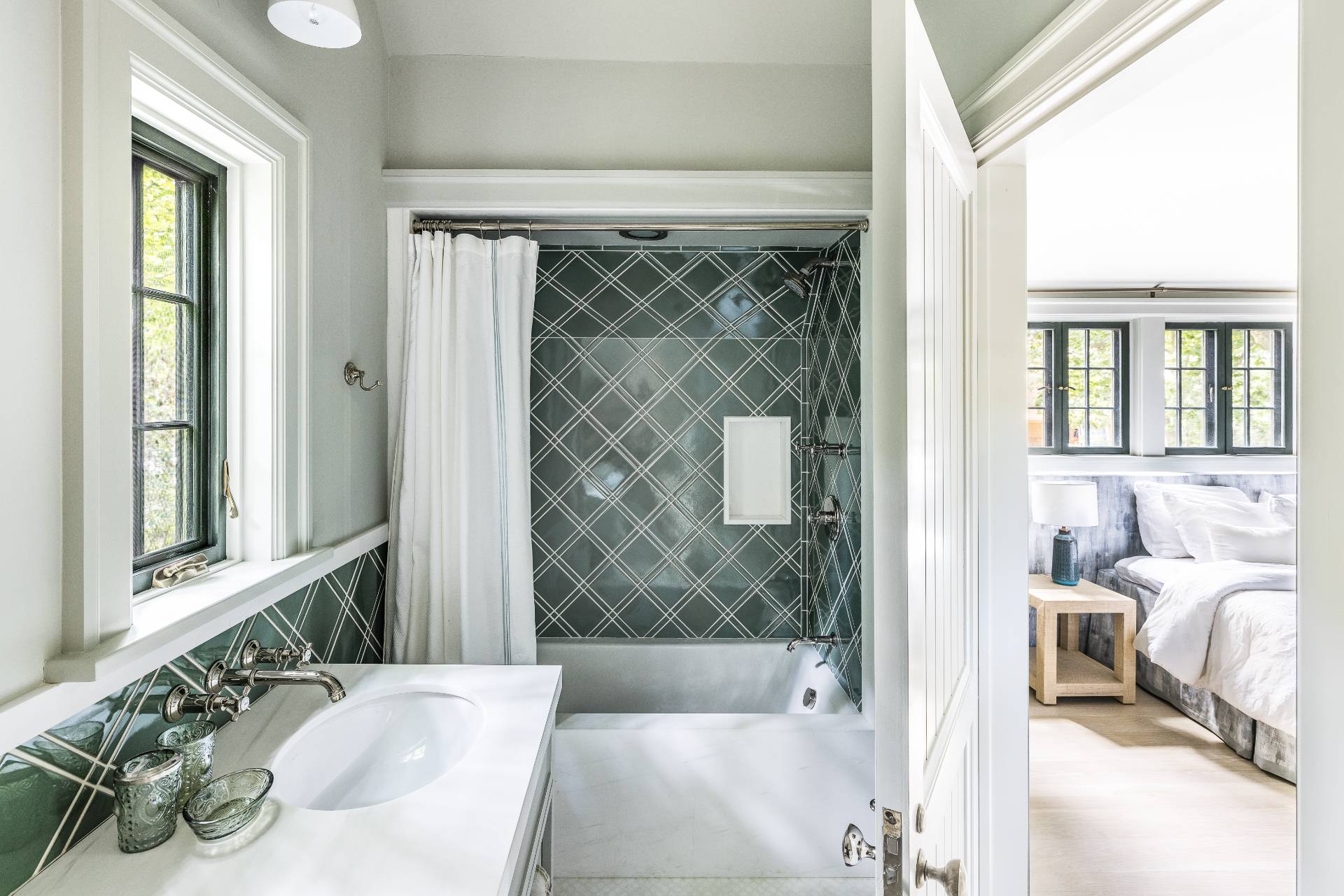 43 Lee Avenue East Hampton, NY 11937 - Photo 35 of 49 a bathroom with a tub sink and mirror