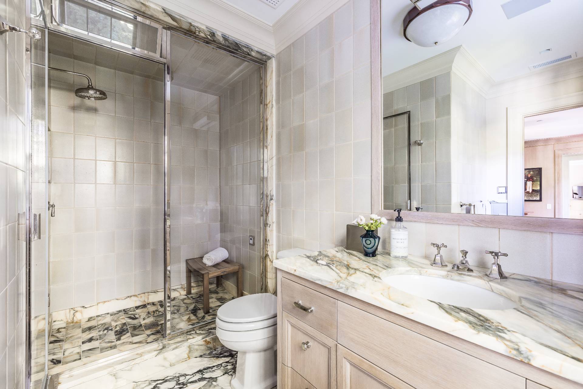 43 Lee Avenue East Hampton, NY 11937 - Photo 39 of 49 a bathroom with a granite countertop sink toilet and shower