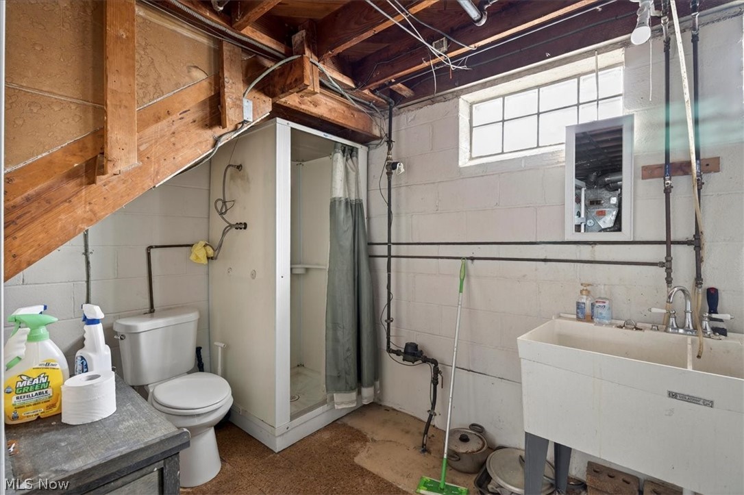 17282 McCracken Road Maple Heights, OH 44137 - Photo 19 of 26 Bathroom with a shower stall and vanity