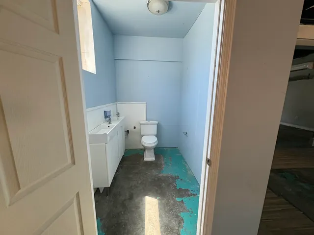 a bathroom with a sink and a toilet