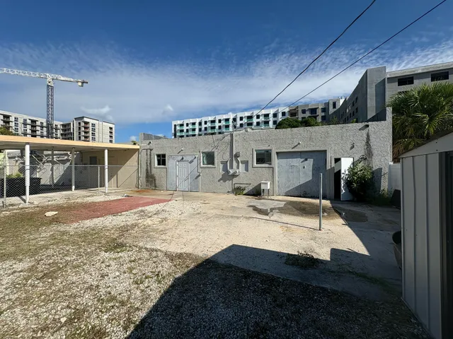 a view of pool table and chairs in patio