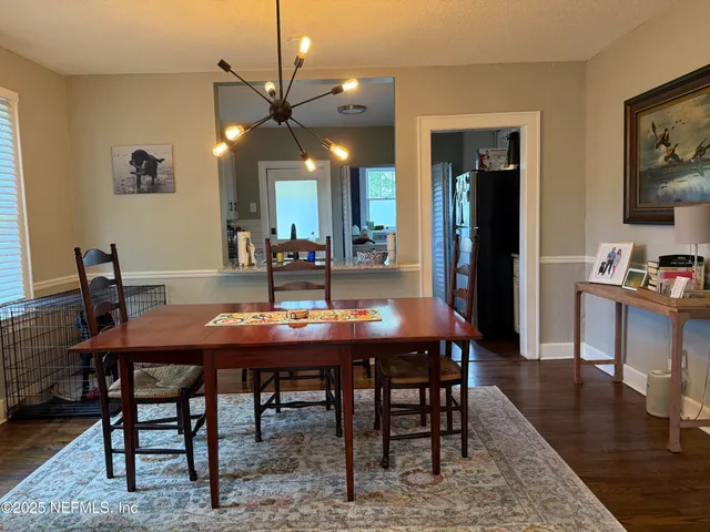 a kitchen with living room