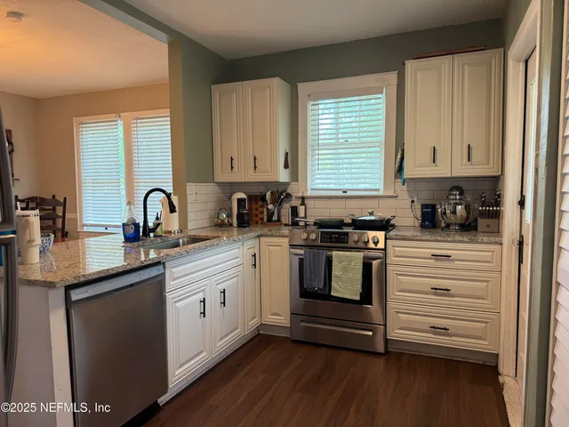 a bedroom with a bed and a desk