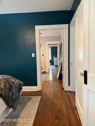 a view of a house with backyard and deck